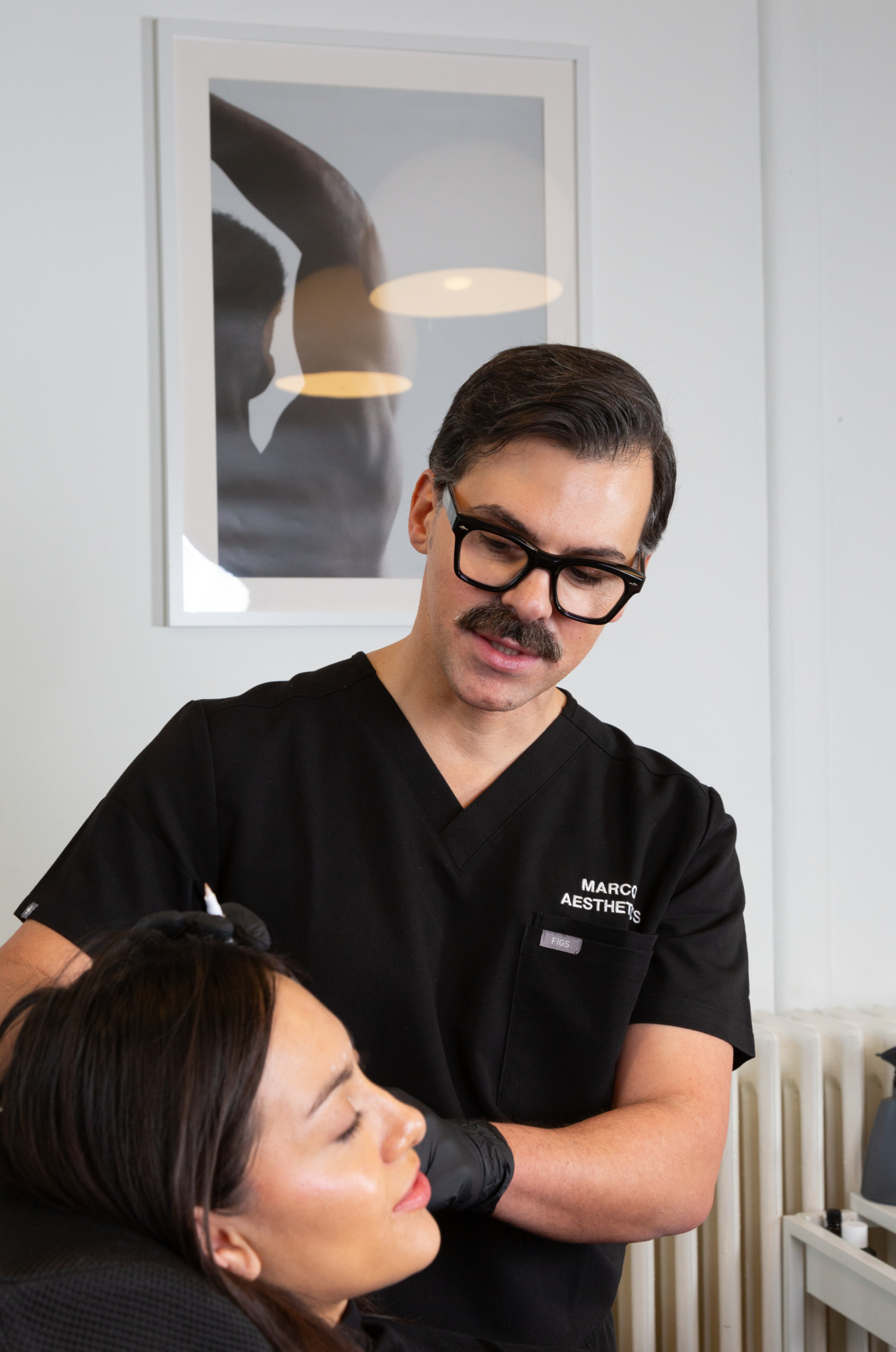 Marco talks to a client in a 1-2-1 consultation